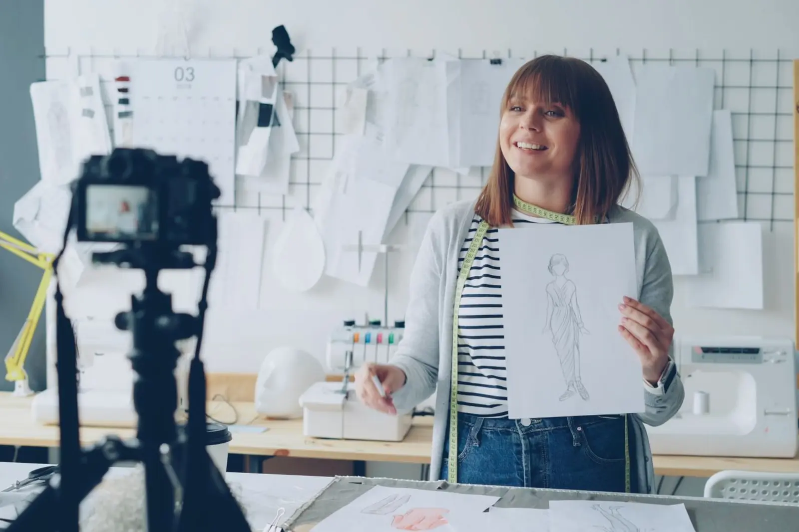 Independent instructor teaching an original lesson to a camera from her studio