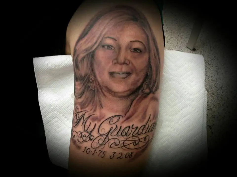 Memorial portrait tattoo with script from the Kalaca Tattoo portfolio