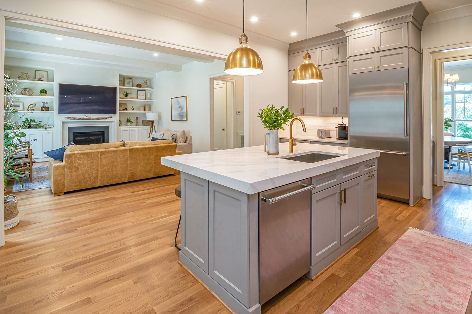 Open-plan kitchen and living space shown as illustrative photography